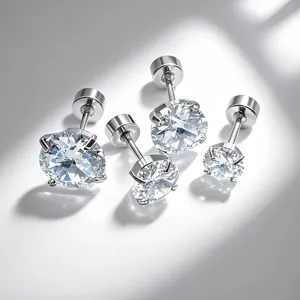 Detail view of stainless steel four-prong cubic zirconia stud earrings in assorted sizes.