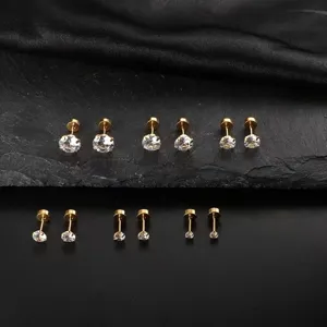 Detailed view of stainless steel gold-toned cubic zirconia stud earrings in various sizes.