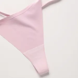 Seamless pink ice silk low waist thong for women, breathable summer underwear, comfortable fit.
