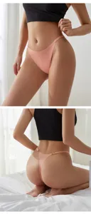 Seamless ice silk low-rise thong for women, comfortable string panty with metal rings.