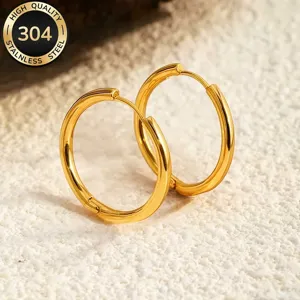 Gold plated stainless steel smooth hoop earrings for women, minimalist daily jewelry wear.