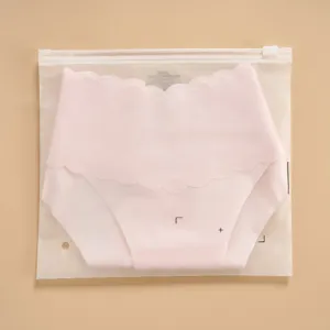 Detailed view of seamless pink scalloped panties in frosted zipper bag closeup view.
