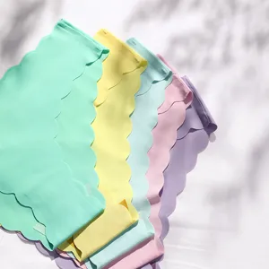 Seamless ice silk women briefs with wavy cloud edges, breathable pastel panties for daily wear.