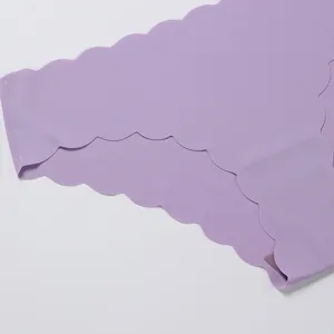 Seamless ice silk women briefs with cute wave edge, breathable summer underwear in light purple.