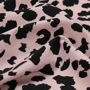 Pink leopard print seamless ice silk breathable fabric material close-up texture view.