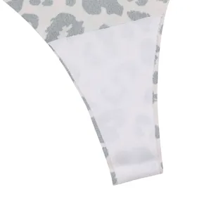 Women's seamless leopard print ice silk low-waist thong underwear main view showing details.