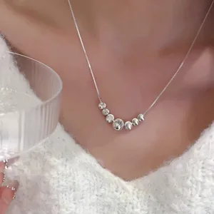 Close-up detail of the S925 sterling silver bead pendant necklace, delicate and elegant.