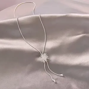 Detailed close-up of the elegant silver firework pendant necklace, showcasing delicate sparkle.