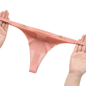 Sexy seamless ice silk pink thong for women, low waist invisible string panties for yoga sports.