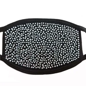 Detailed view of black double-layer cotton face mask covered with sparkling rhinestone crystals.