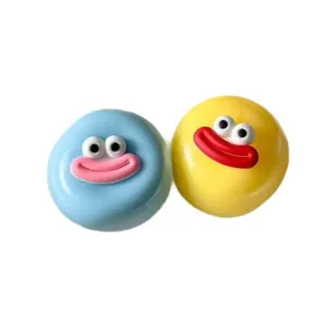 Cute big-eye sausage mouth squishy toy detail, slow rebound stress relief ball close up view.
