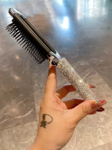 Mini portable rhinestone folding comb with mirror, compact travel hair brush for women.
