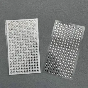 Details view of acrylic rhinestone stickers for makeup DIY crafts, face and nail decoration.