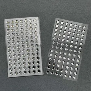 Acrylic rhinestone face stickers detail shot, clear round crystal gems for DIY makeup and festival.