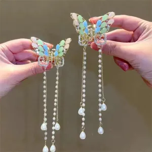 Exquisite butterfly hair claw with pearl tassels, sparkling rhinestones, perfect for half-up hairstyles.
