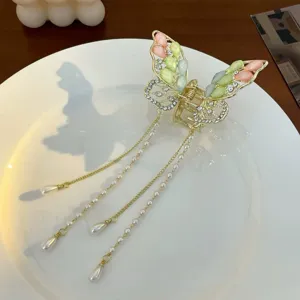 Exquisite butterfly tassel hair claw clip with rhinestones, elegant hair accessory for women.