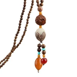 Etnische stijl houten lange kraal trui ketting ketting met lotus en kleurrijke fruit hangers.
