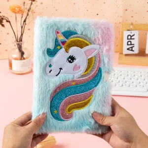 Cute plush unicorn notebook with lock, fluffy diary for students and kids gift, detail shot.