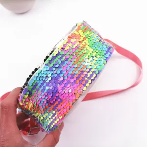 Rainbow sequin unicorn crossbody bag for kids, sparkling glitter round shoulder bag with pink strap.