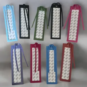 PU leather cross stitch bookmark detail showcasing multiple vibrant colors and adhesive back.