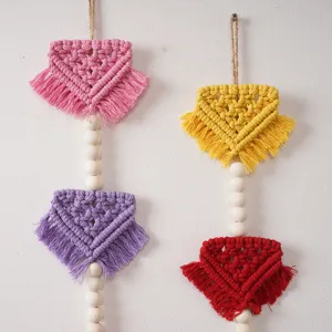 Bohemian woven wall hanging with colorful tassel flags and wooden beads for kids room decor.