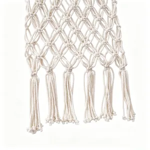 Handmade cotton macrame net bag detail, eco-friendly reusable fruit storage shopping tote.