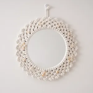 Nordic handmade woven cotton rope wall mirror with seashell decor for home and living room.