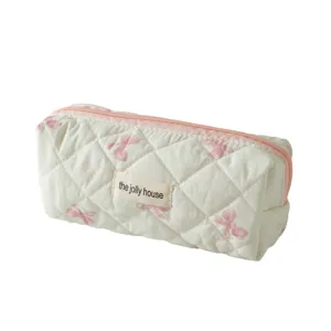 Quilted cosmetic bag with pink bows, cute student pencil pouch and portable storage organizer.