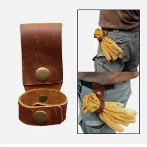Vue de détail du clip de gant de travail en cuir rétro pour ceinture, support d'outil.