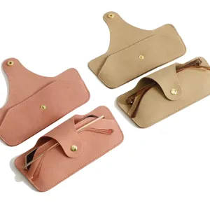 Minimalist microfiber folding glasses case in pink and khaki, stylish portable storage pouch for travel.