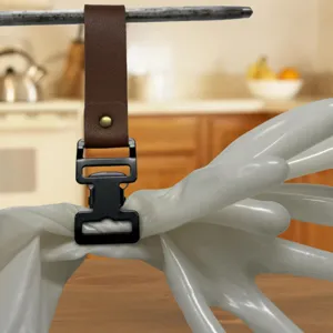 Close-up detail of the metal and leather glove clip hanging on rod, showing robust clasp structure.