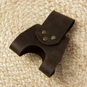 Brown leather axe sheath, portable belt loop holster for outdoor camping and survival tools.