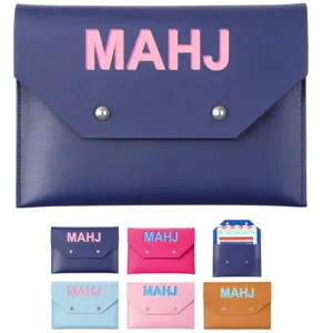 PU leather mahjong rules card storage bag game card holder with magnetic snap closure.