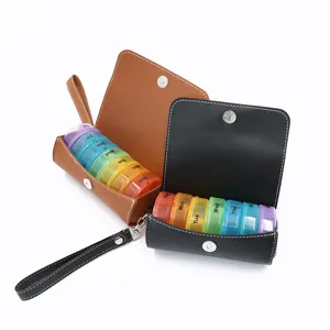 Portable 7-day pill organizer with PU leather case, weekly vitamin travel medicine box.