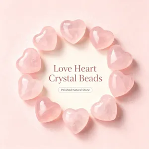 Gros plan de perles de cœur en quartz rose poli de 15 mm pour la création de bijoux