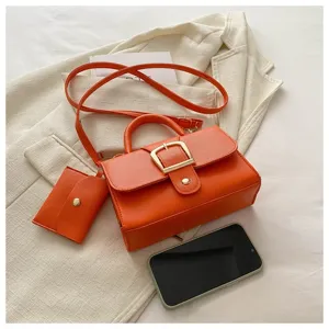 Stylische orangefarbene Umhängetasche in Bonbonfarbe mit passendem Mini-Beutel Set
