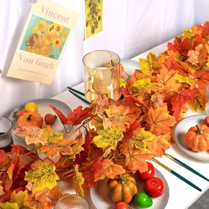 Realistic artificial maple leaf garland with decorative pumpkins for autumn table decor