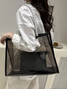 Große durchsichtige PVC-Tragetasche mit Innentasche und weißen Seilgriffen für Damen