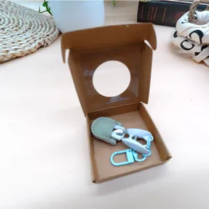 Mini household thread scissors with leather sleeve and compact paper box packaging for daily craft use