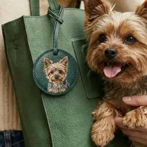 Handmade custom pet PU leather bag charm with a cute dog portrait pendant detail.