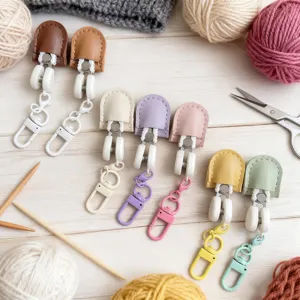 Colorful leather dummy clips and suspender holders set with metal hooks for craft and baby use.