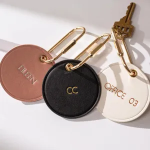 Porte-clés rond en cuir et laiton personnalisé, accessoire de sac élégant et anneau anti-perte portable.