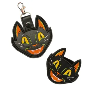 Halloween black cat PU leather keychain portable bag pendant cute embroidered charm accessory.