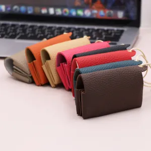 Mini bolsa portátil de papel de cuero PU, bolso de almacenamiento colgante de color sólido.