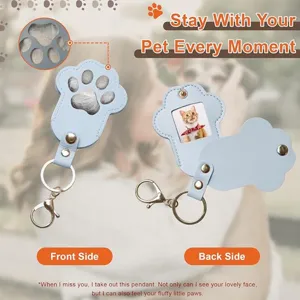 Cute pet memorial leather keychain with fur storage and photo holder for cat and dog lovers.