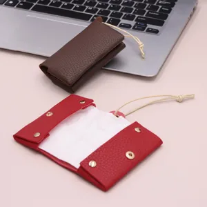 Mini bolsa portatil de papel de cuero PU con cuerda colgante para uso diario en el hogar.