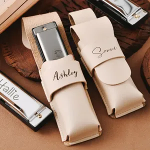 Detailed view of portable PU leather harmonica pouch with custom laser engraved name style.