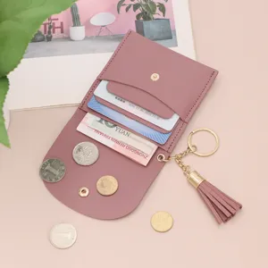 Portacarte in pelle PU rosa mini portafoglio con portachiavi nappa e tasca portamonete chic.