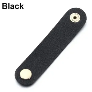 Black PU leather cable organizer strap detail view, metal snap button close-up shot.