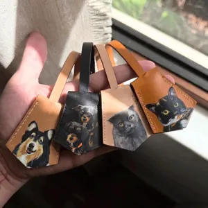 Custom hand-painted pet leather luggage tags, cute dog and cat charm key bag pendants.